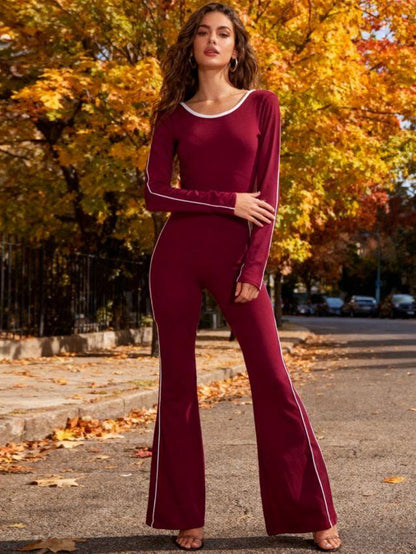 MILA – Sporty chic backless jumpsuit with contrasting details