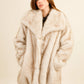 Chic faux fur coat with oversized collar, elegant cocoon style