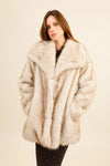 Chic faux fur coat with oversized collar, elegant cocoon style