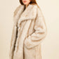 Chic faux fur coat with oversized collar, elegant cocoon style