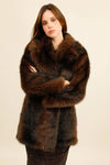 Mid-length faux fur coat with a wide collar, featuring an elegant and trendy cut
