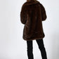 Chic faux fur coat with oversized collar, elegant cocoon style