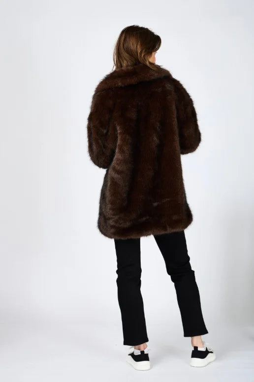 Chic faux fur coat with oversized collar, elegant cocoon style