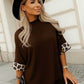 High-neck sweater with leopard cuffed sleeves