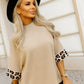 High-neck sweater with leopard cuffed sleeves