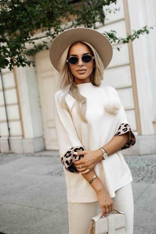 High-neck sweater with leopard cuffed sleeves
