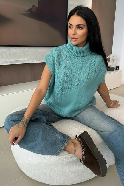 Sleeveless turtleneck sweater with gradient cables