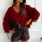 V-neck sweater with fringes