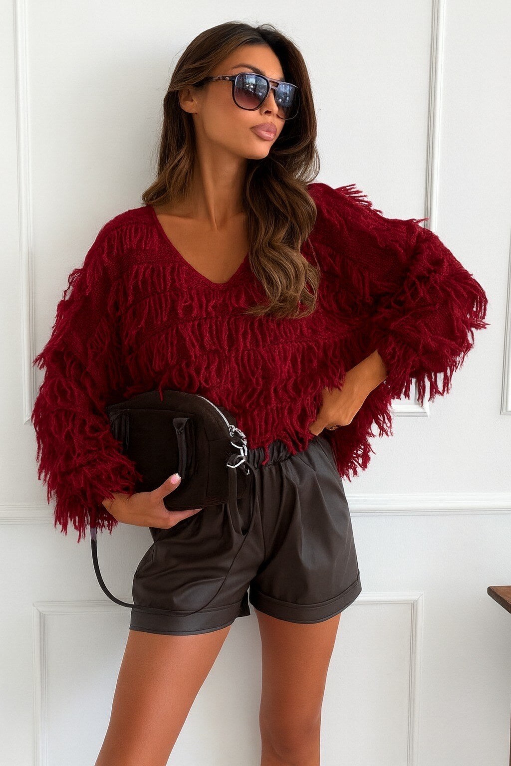 V-neck sweater with fringes