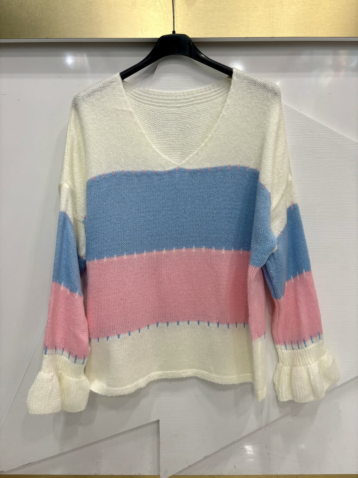 V-neck sweater with multicolored stripes and long sleeves