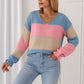 V-neck sweater with multicolored stripes and long sleeves