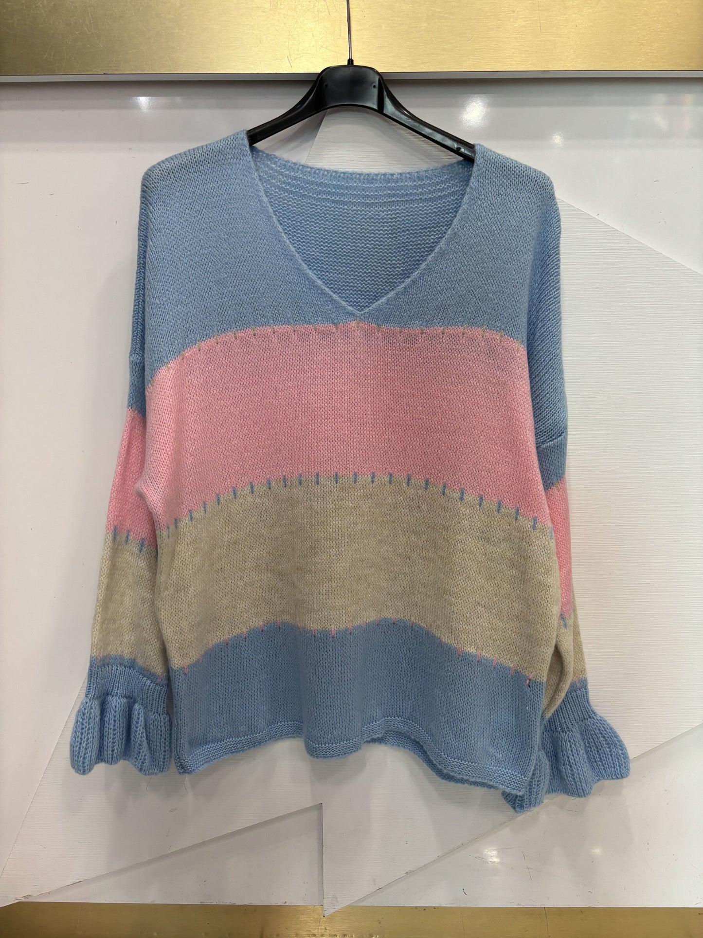 V-neck sweater with multicolored stripes and long sleeves