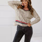 White twisted jerk V -neck sweater with tricolor strips