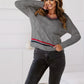 White twisted jerk V -neck sweater with tricolor strips