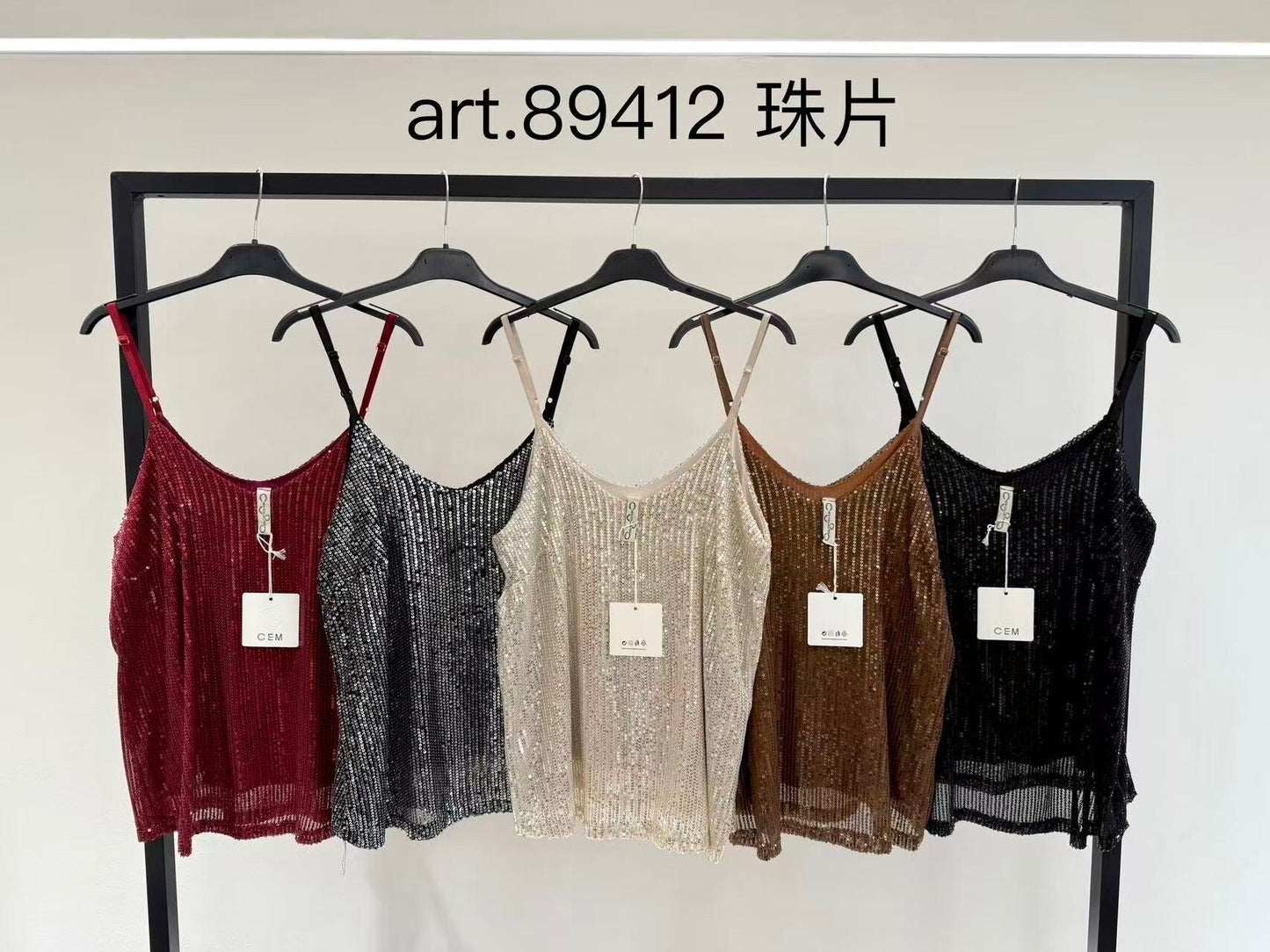 Top with thin straps and shiny sequins