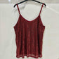 Top with thin straps and shiny sequins