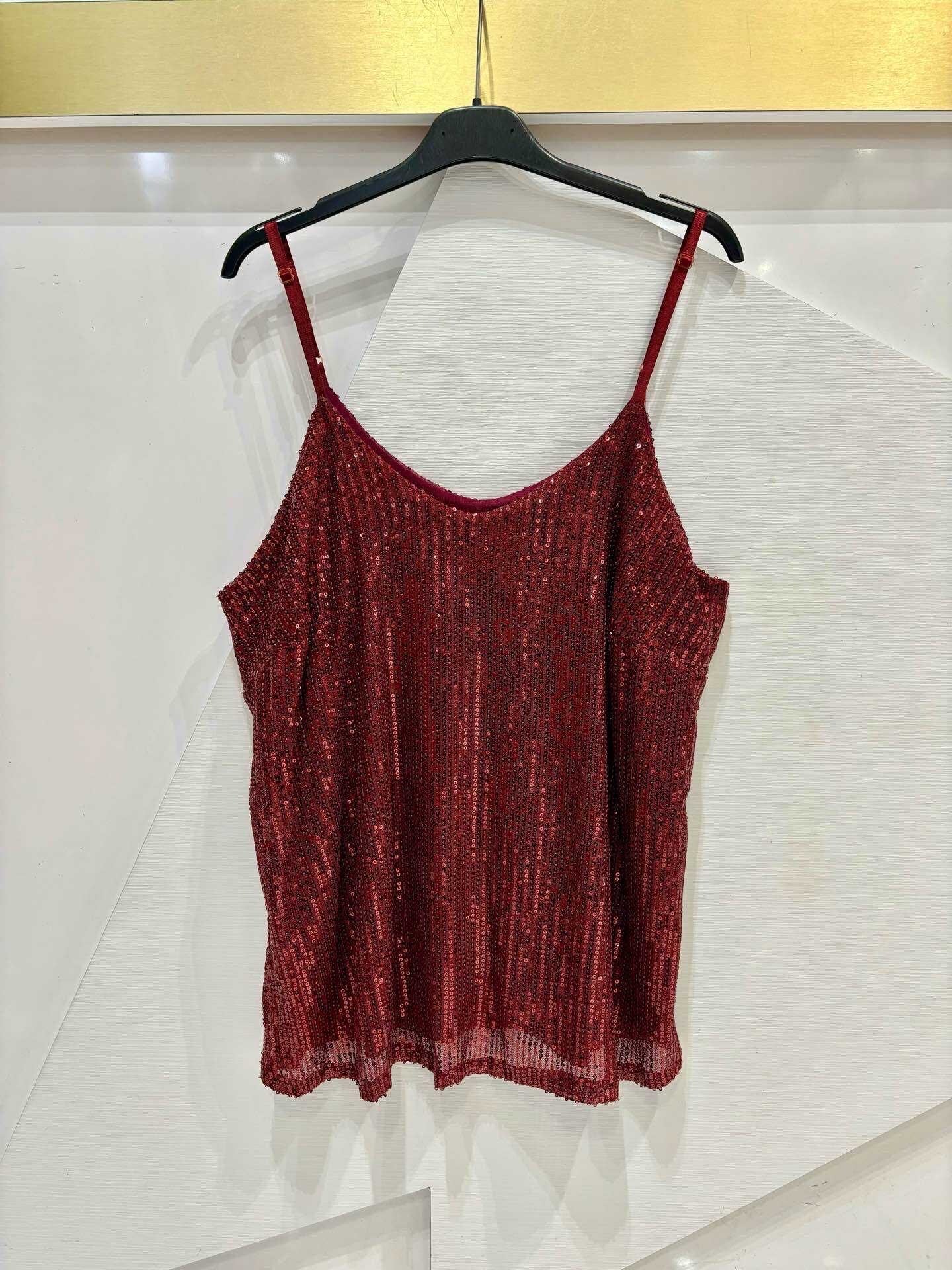 Top with thin straps and shiny sequins