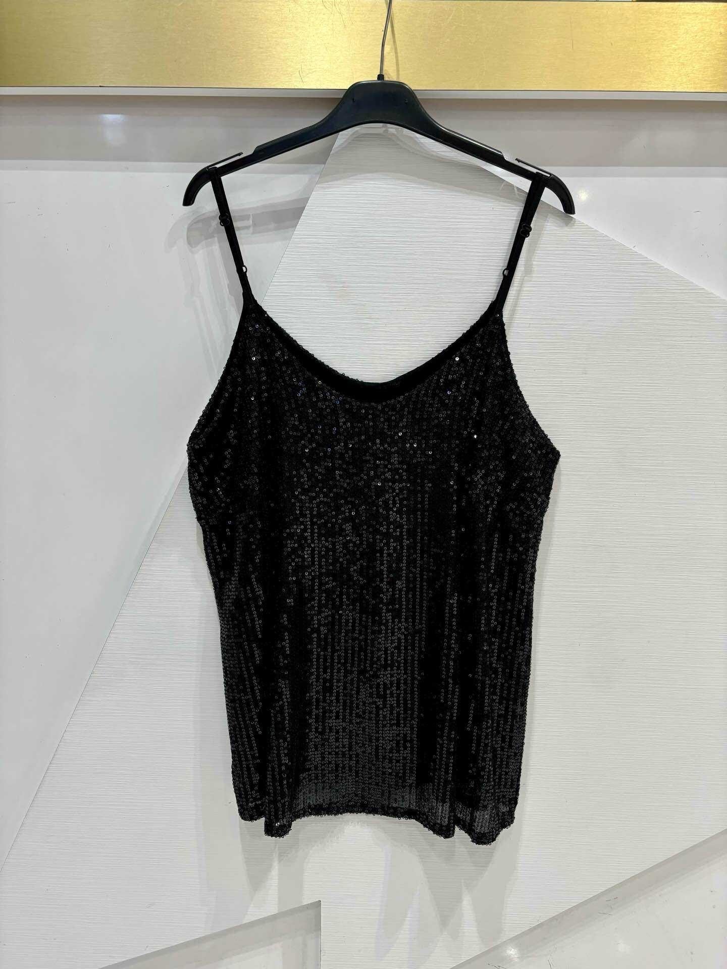 Top with thin straps and shiny sequins