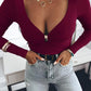 Top with neckline with long sleeve ring