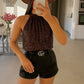 Sequined velvet top with bow at the back