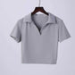 Fitted top with short sleeves, polo collar and V-neck