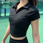 Fitted top with short sleeves, polo collar and V-neck