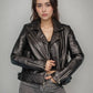 Short faux leather jacket with quilted stitching and zip details