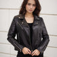 Short faux leather jacket with quilted stitching and zip details