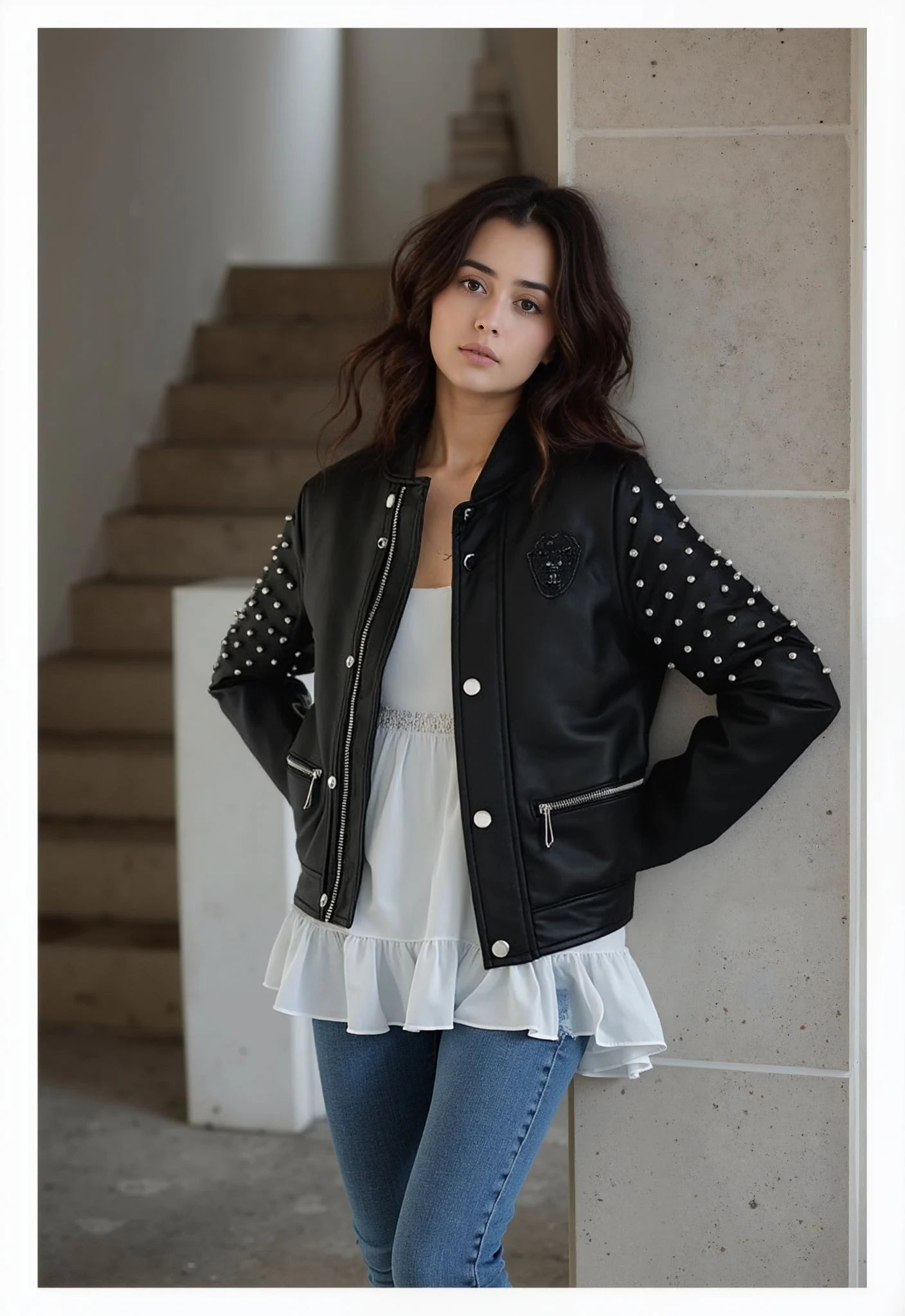 Short faux leather biker jacket with zip and quilted details