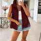 Sleeveless faux suede fringe vest with buttons