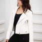 Smooth faux leather jacket, cropped cut, notched collar, and silver zips for a bold look.