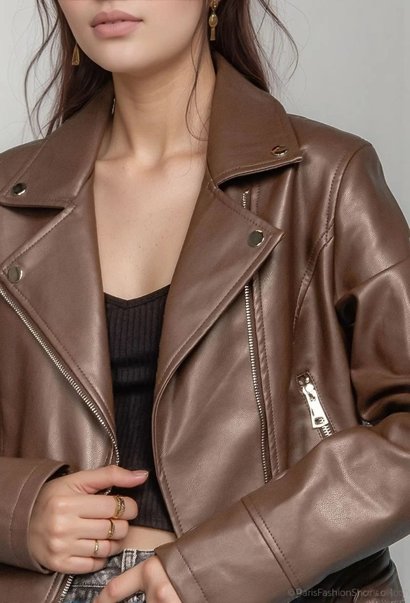 Smooth faux leather jacket, cropped cut, notched collar, and silver zips for a bold look.