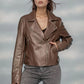 Smooth faux leather jacket, cropped cut, notched collar, and silver zips for a bold look.