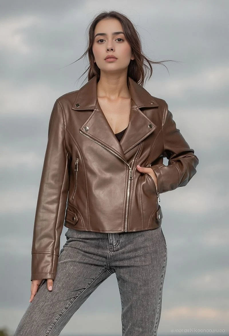Smooth faux leather jacket, cropped cut, notched collar, and silver zips for a bold look.