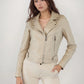 Smooth faux leather jacket, cropped cut, notched collar, and silver zips for a bold look.
