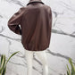 Oversized faux leather jacket with adjustable drawstrings