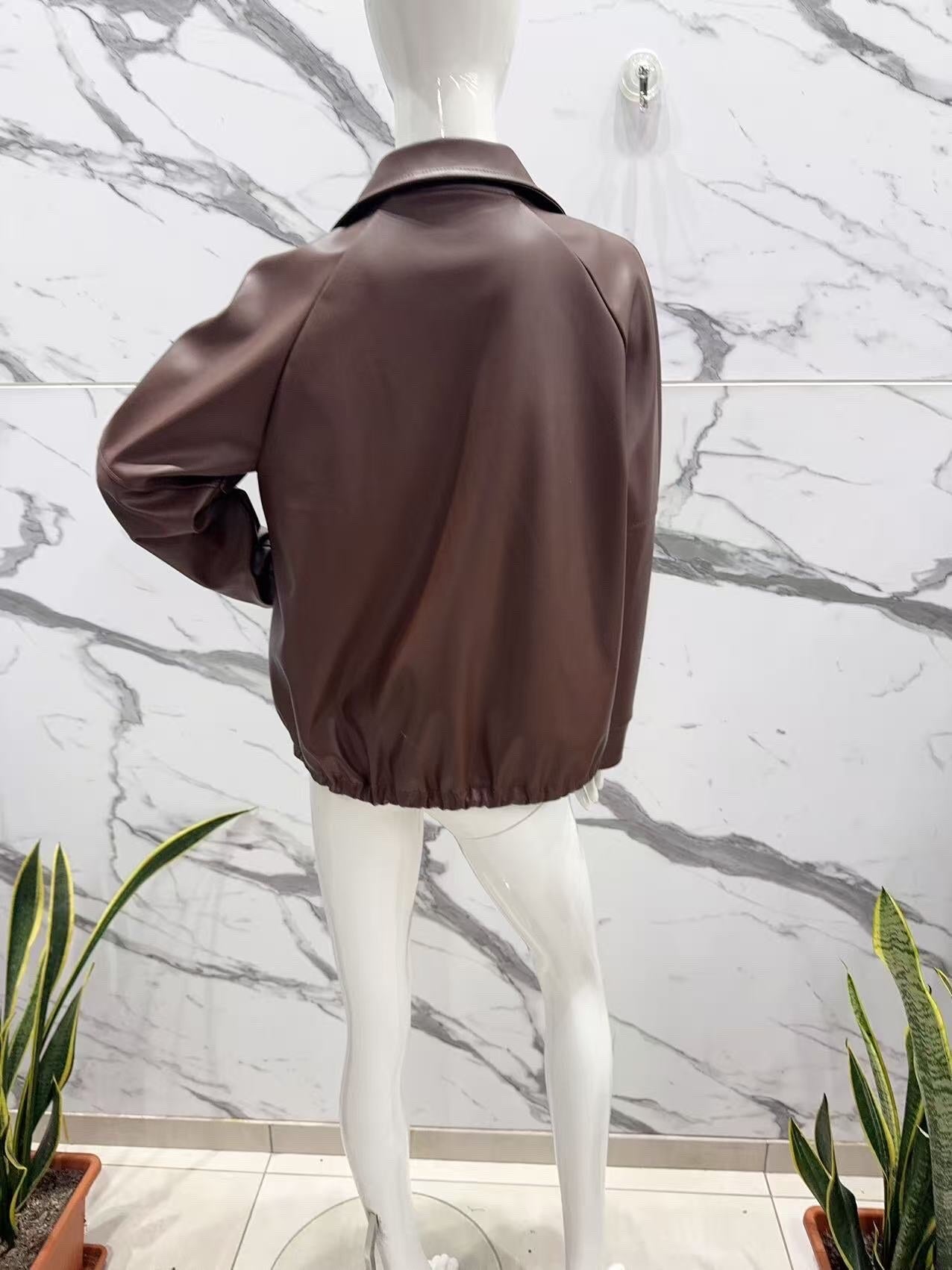Oversized faux leather jacket with adjustable drawstrings