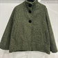 Poncho style wool jacket loop with large black pimples