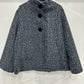 Poncho style wool jacket loop with large black pimples
