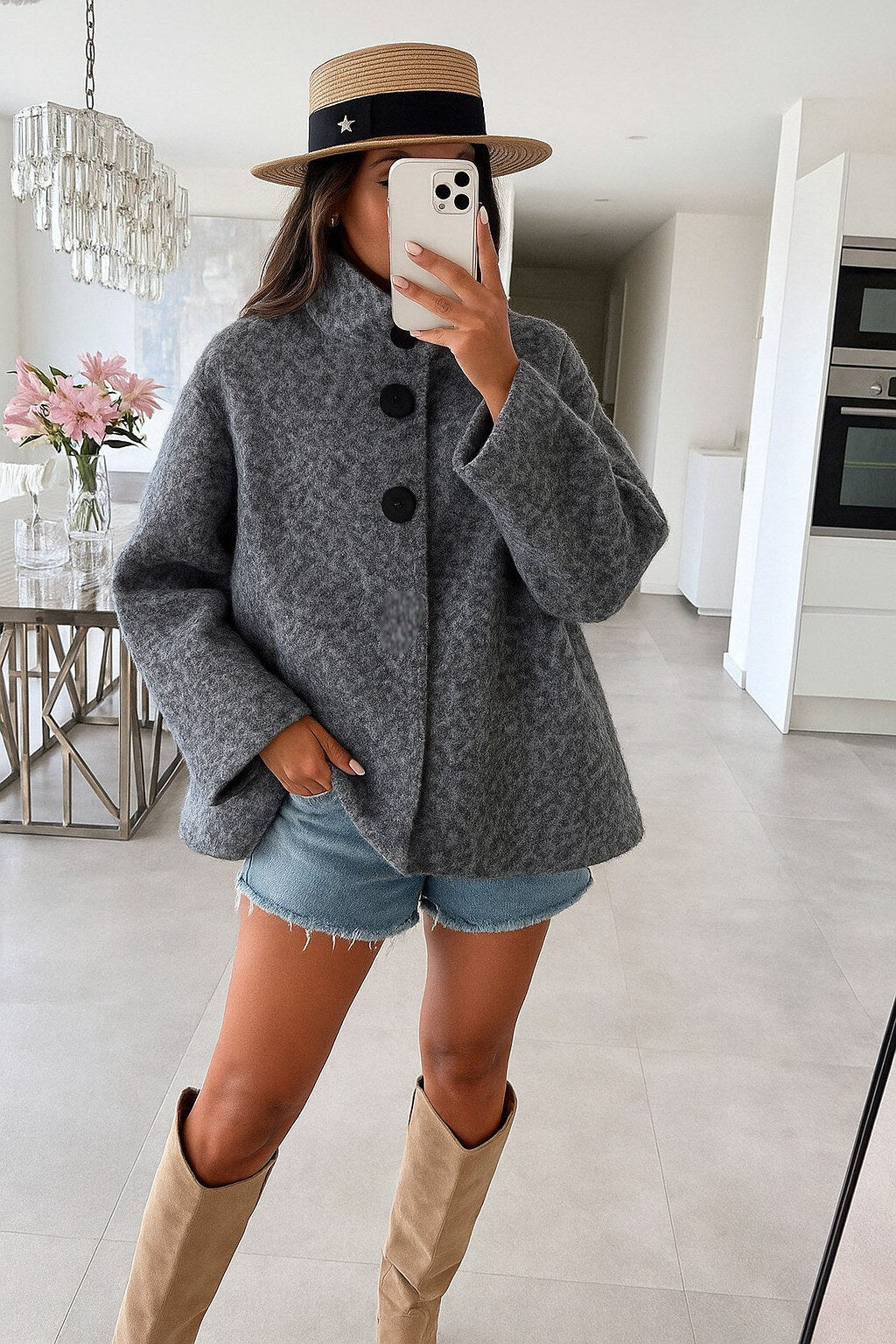 Poncho style wool jacket loop with large black pimples